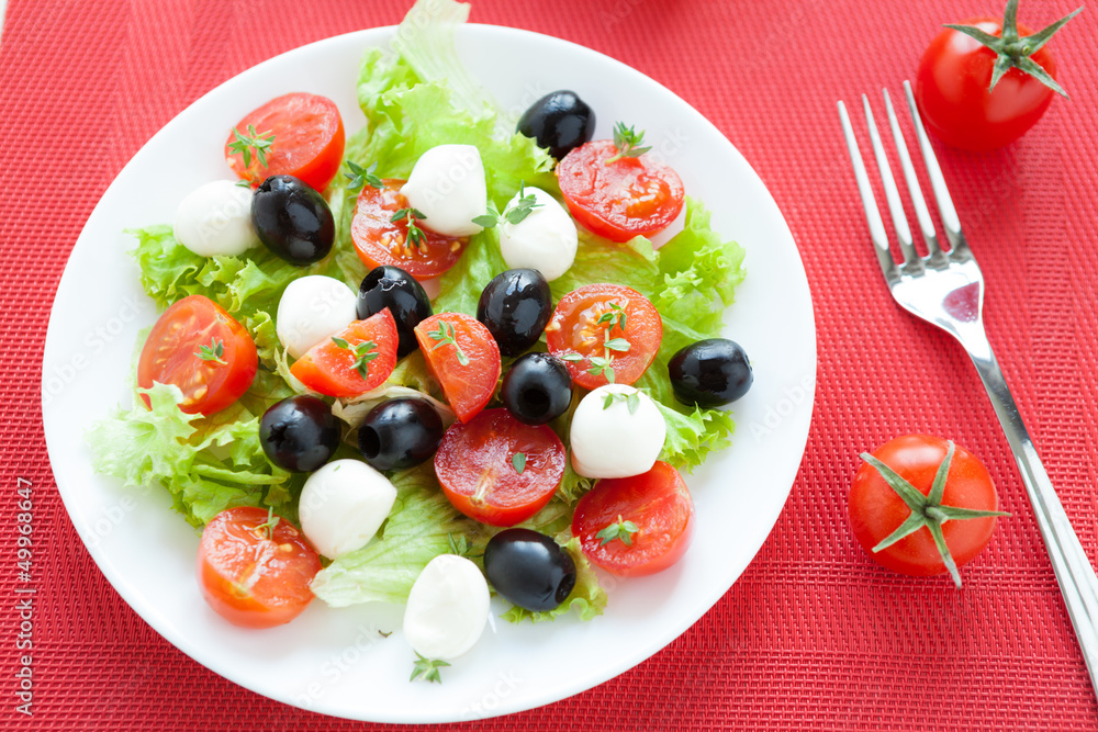 Caprese salad with cherry tomatoes