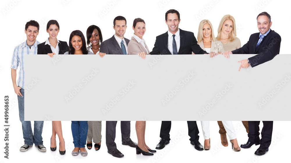 Group of business people presenting empty banner Group of business people presenting empty banner