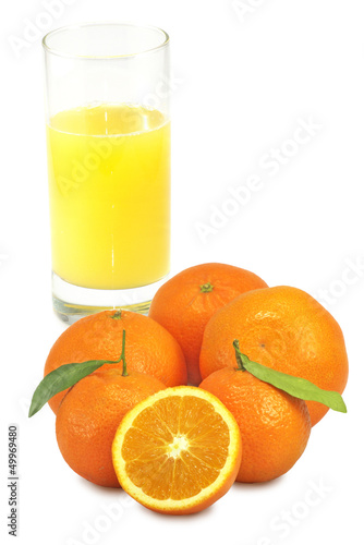 glass of juice and citrus