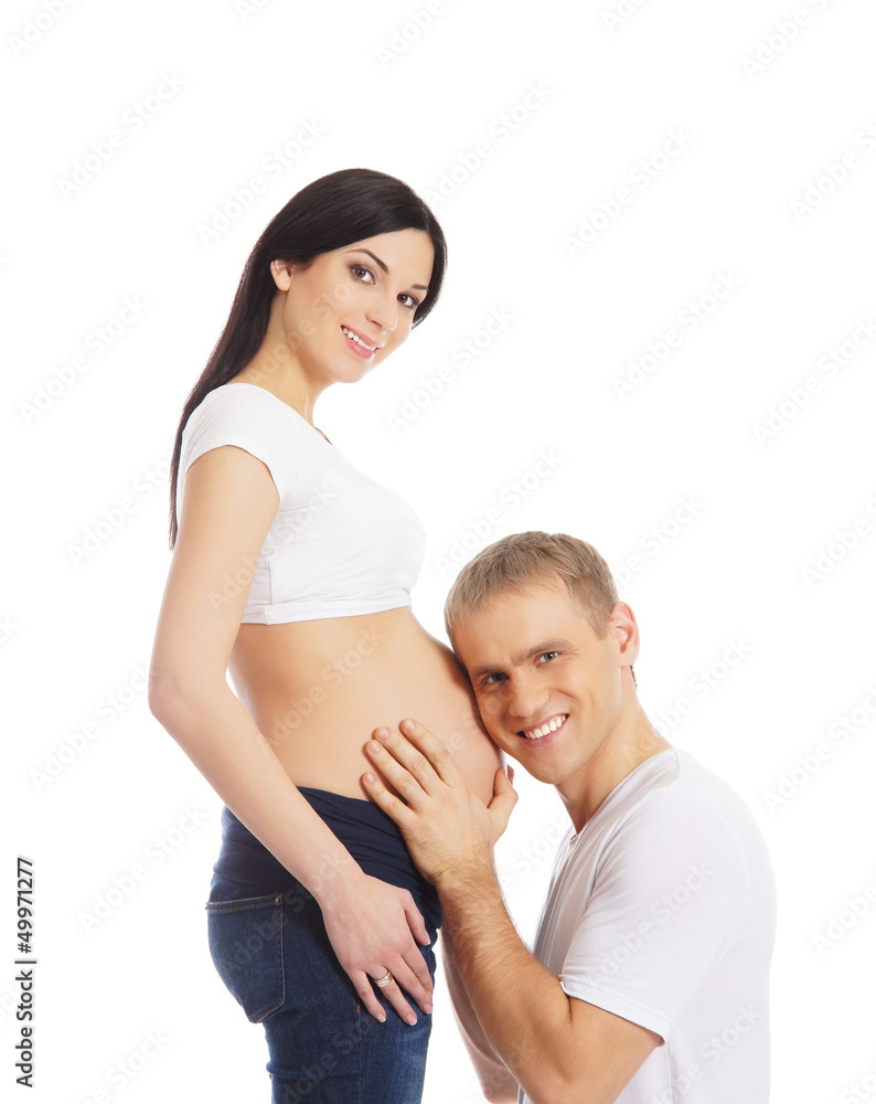 A young and lovely Caucasian couple waiting for the baby A young and lovely Caucasian couple waiting for the baby