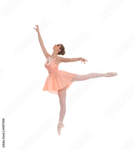 A young and beautiful ballet dancer isolated on white