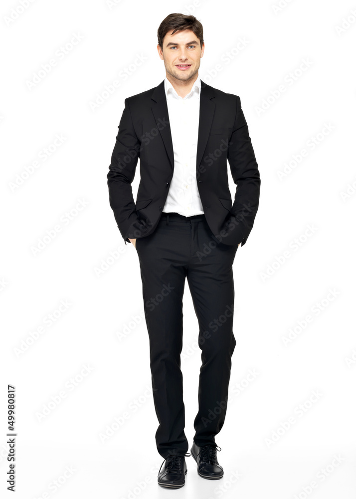 Portrait of smiling businessman in black suit