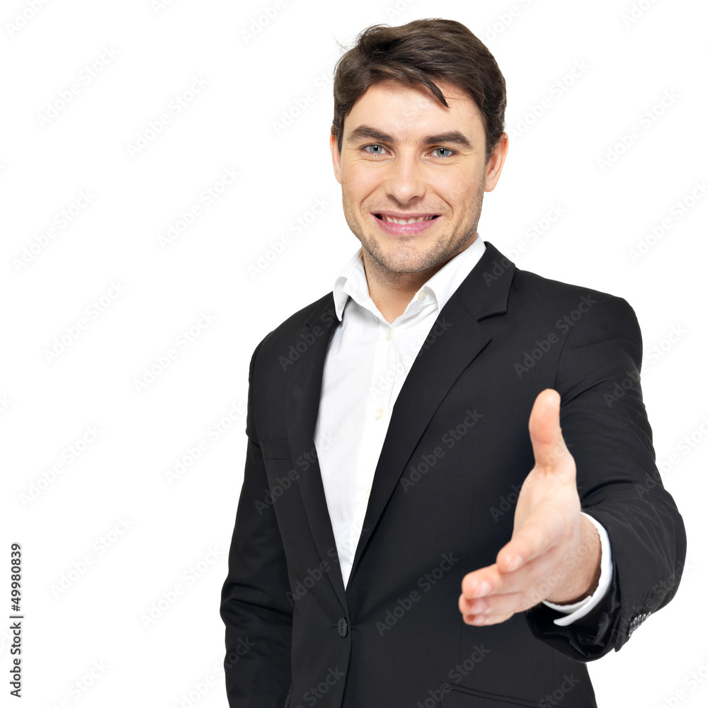 Smiling businessman in black suit gives handshake Smiling businessman in black suit gives handshake