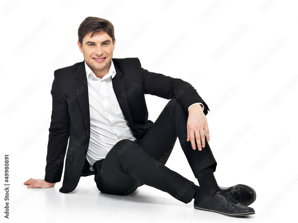 businessman sitting on the floor businessman sitting on the floor