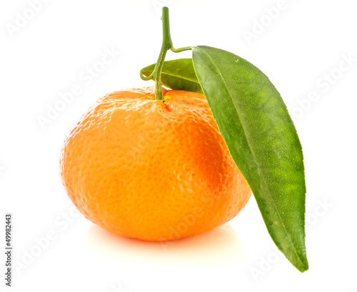 Fresh orange mandarin with leafs on a white background