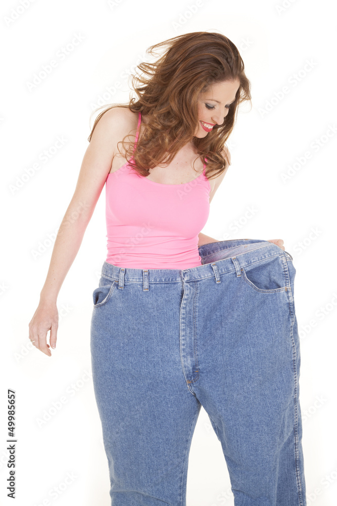 Woman pink top look down big pants Woman pink top look down big pants