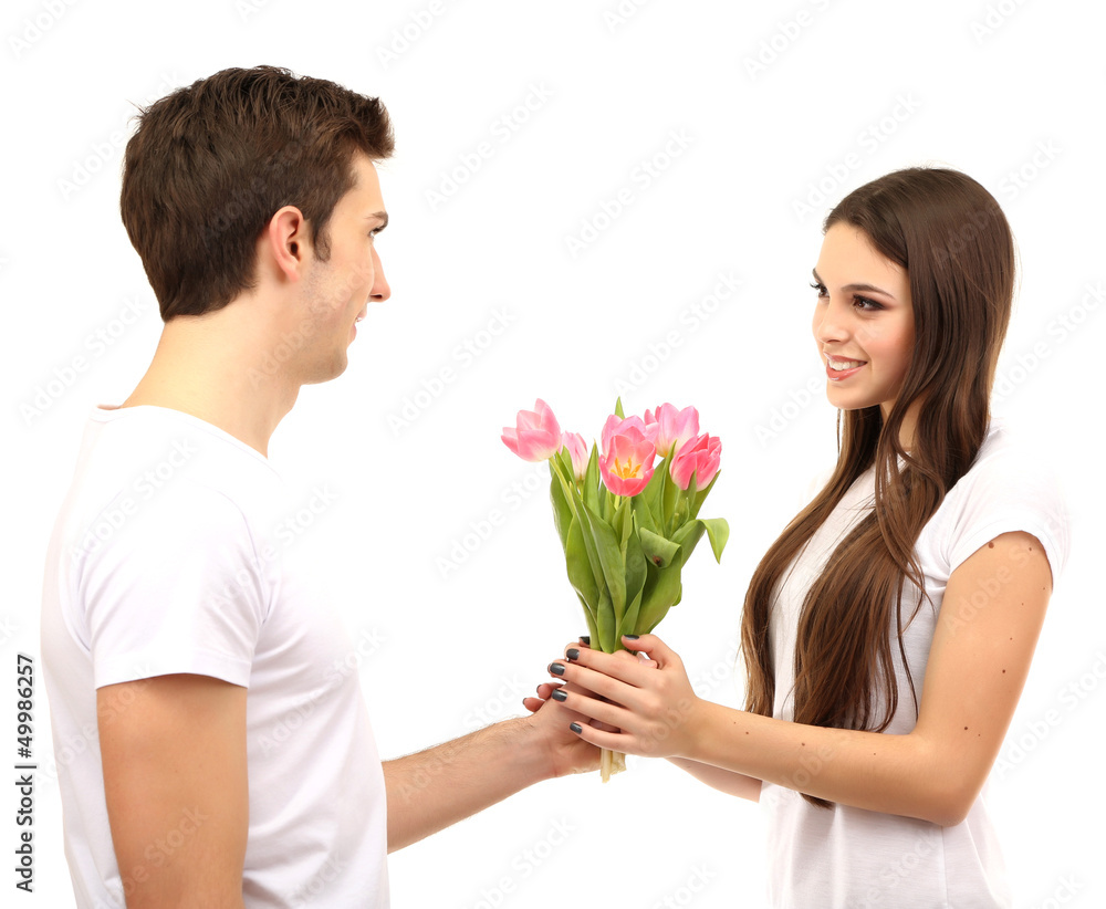 Loving couple with tulips isolated on white