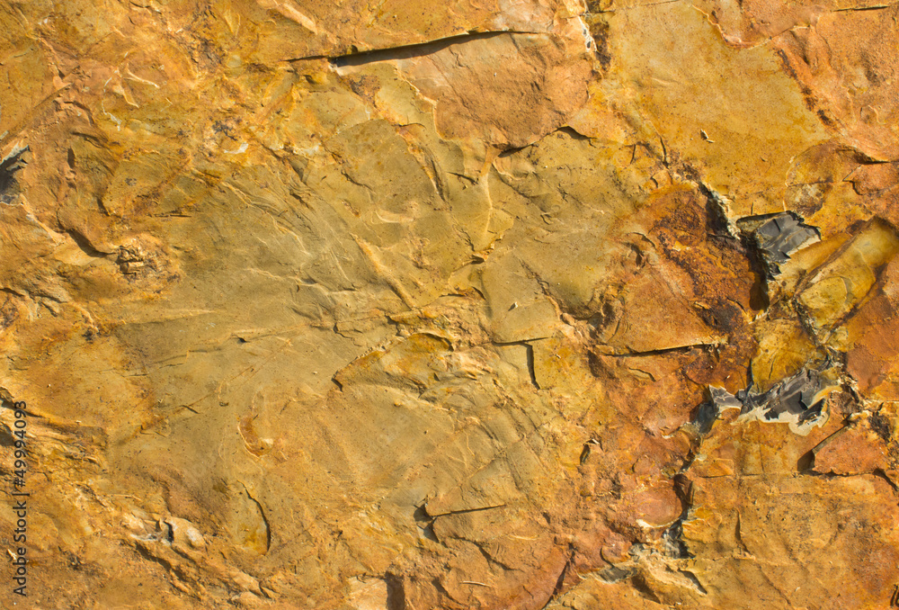 Texture of brown stone. With a beautiful patterns. Texture of brown stone. With a beautiful patterns.