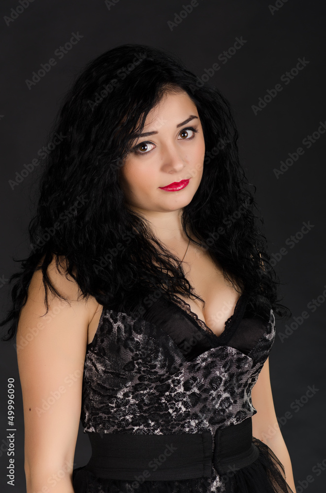 Portrait of young woman with black dress posing Portrait of young woman with black dress posing