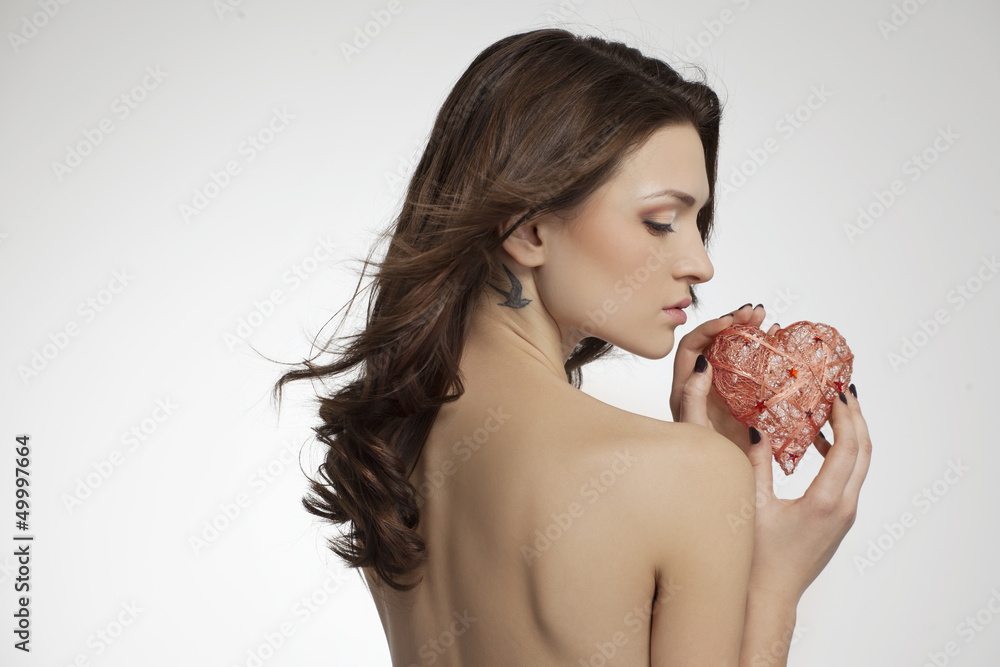 beautiful naked girl with a gift on Valentine's Day