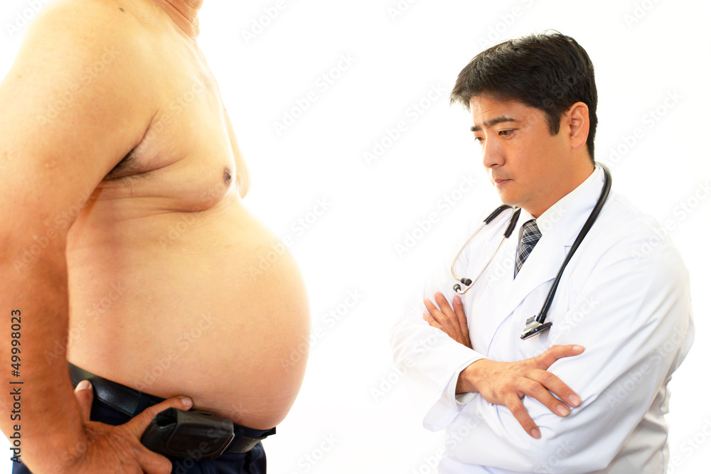肥満患者を心配する医師