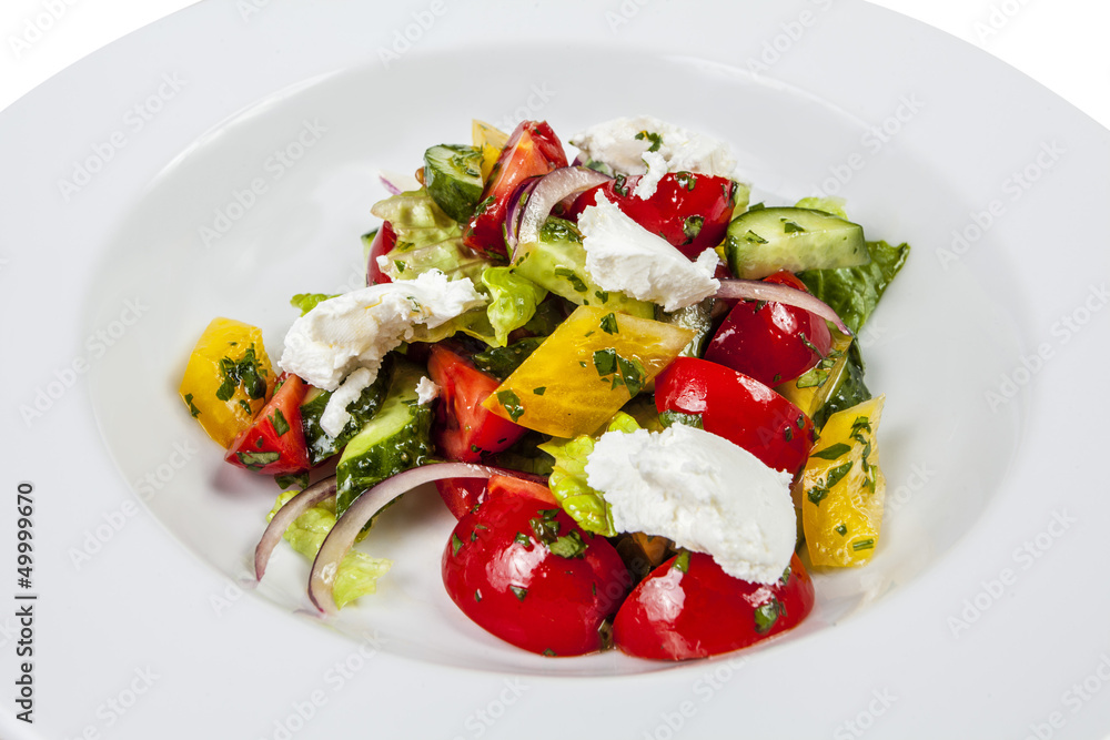 Greek salad on white isolated background