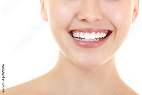 Beautiful smile of young fresh woman with healthy white teeth