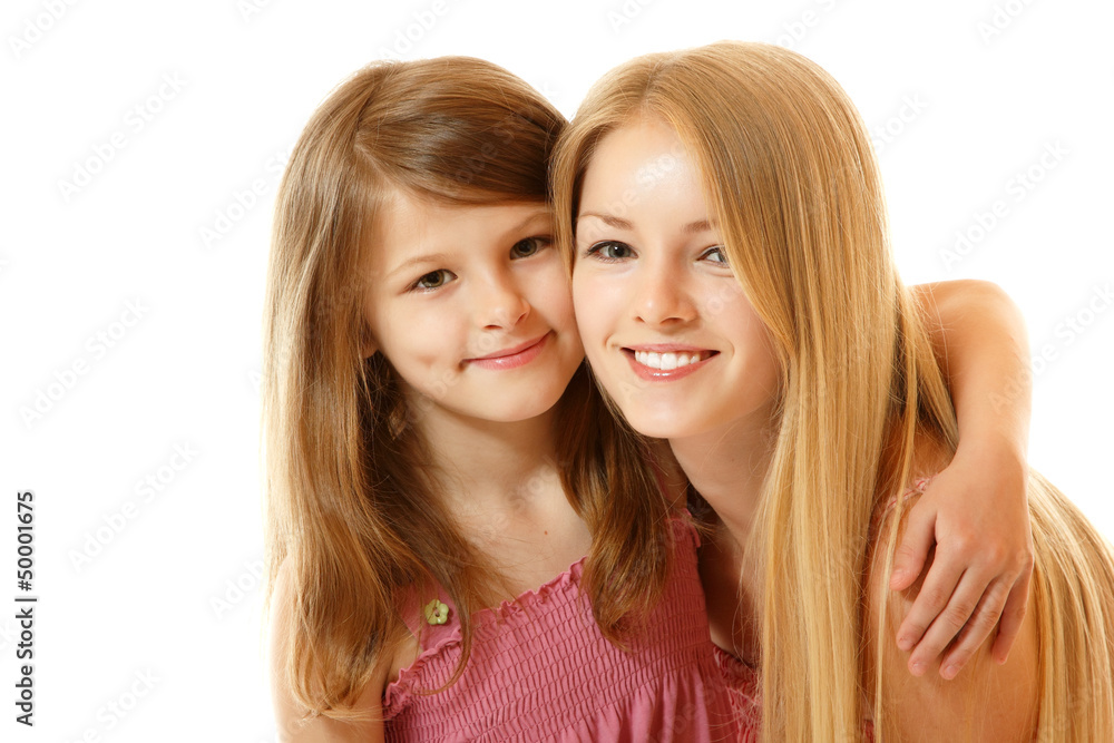 portrait of two sisters happy smiling portrait of two sisters happy smiling