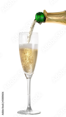 Champagne pouring into a glass