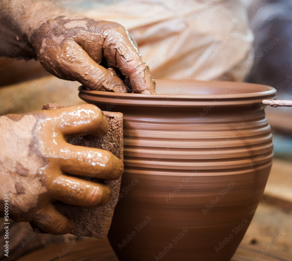 Potter Hands Making In Clay On Pottery Wheel. Potter Makes A Pottery On The Pottery  Wheel Clay Pot. Stock Photo, Picture and Royalty Free Image. Image 43434768.