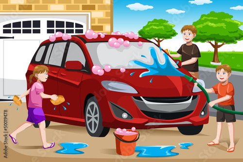 Father and his kids washing car