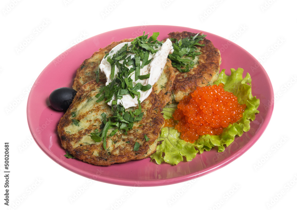 Roasted cutlets of potato with salmon on a plate Roasted cutlets of potato with salmon on a plate