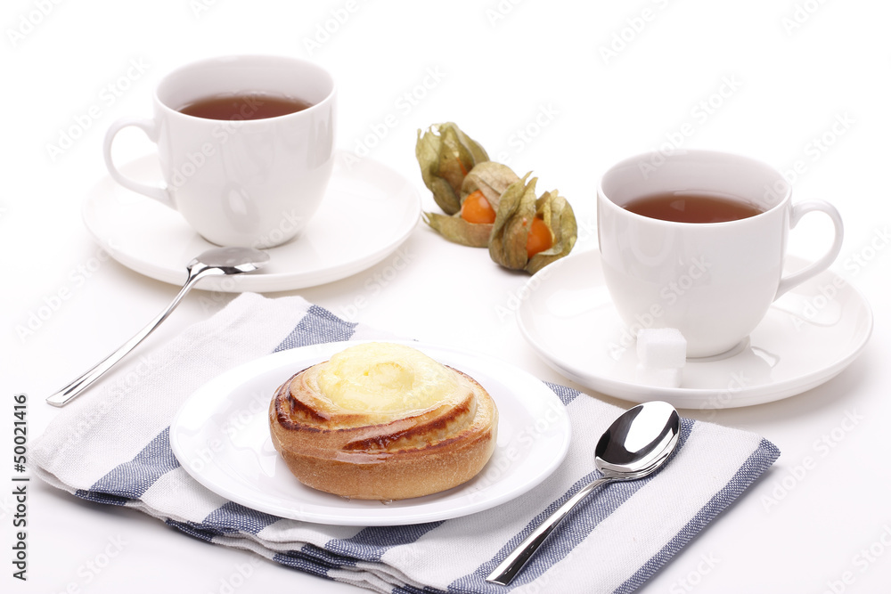Two teacup with cute cream bun Two teacup with cute cream bun