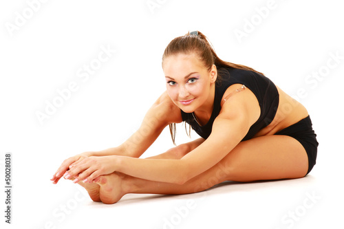 smiling woman doing stretching excersises