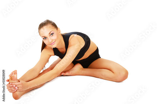 smiling woman doing stretching excersises