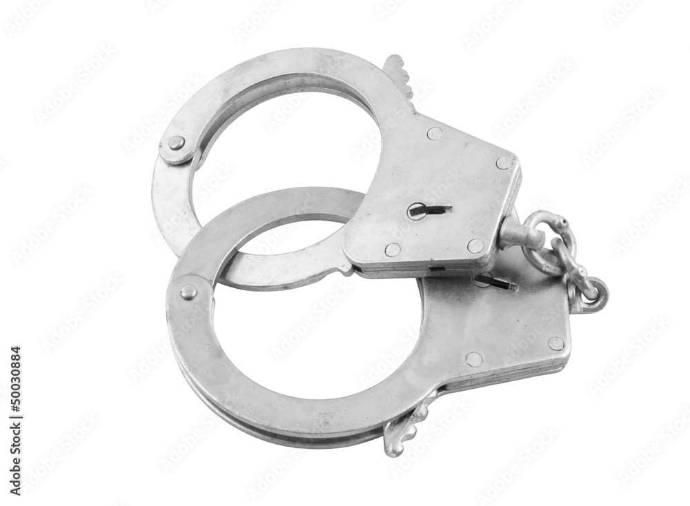 Steel metallic handcuffs isolated on white background Steel metallic handcuffs isolated on white background