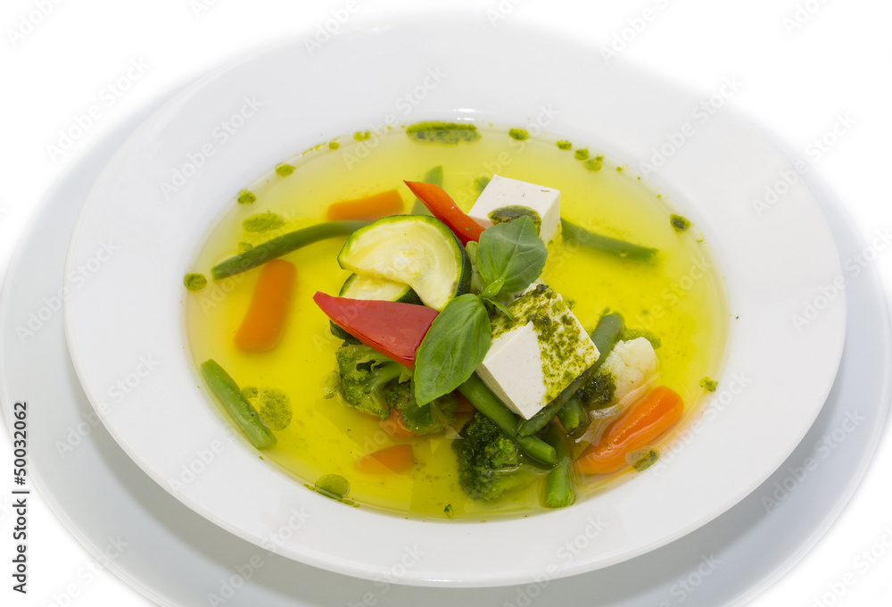 soup made of vegetables on a table in a restaurant soup made of vegetables on a table in a restaurant