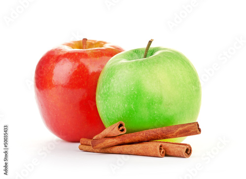 Red and green apples, cinnamon sticks
