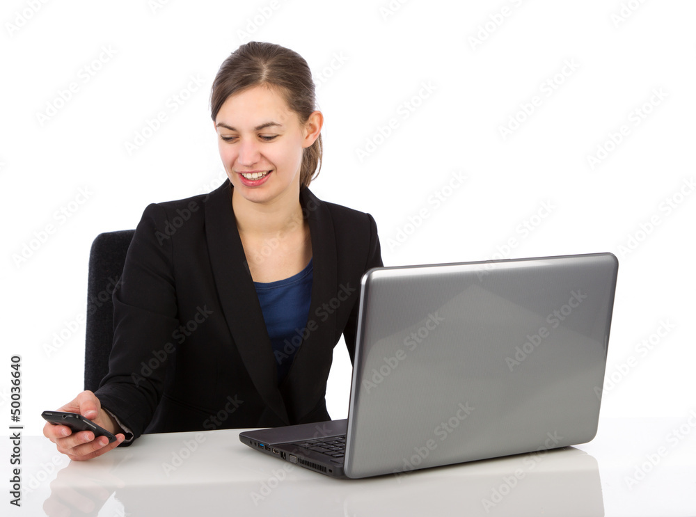 Attractive business woman looking on her smartphone Attractive business woman looking on her smartphone