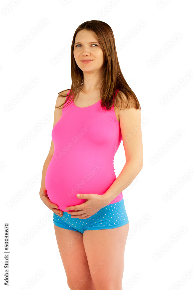 Pregnant woman holding belly in pink and blue. Pregnant woman holding belly in pink and blue.