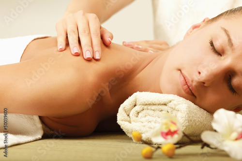 An attractive woman getting spa treatment