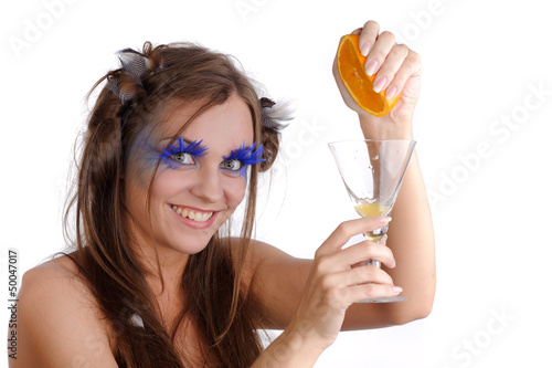 girl making fresh orange drink