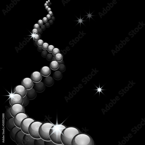Glass beads on black, jewelry background