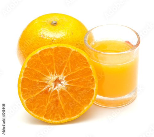 Orange juice and oranges isolated on white background