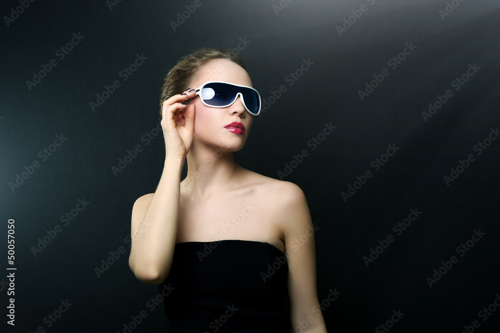 Fashionable lady wearing sunglasses Fashionable lady wearing sunglasses