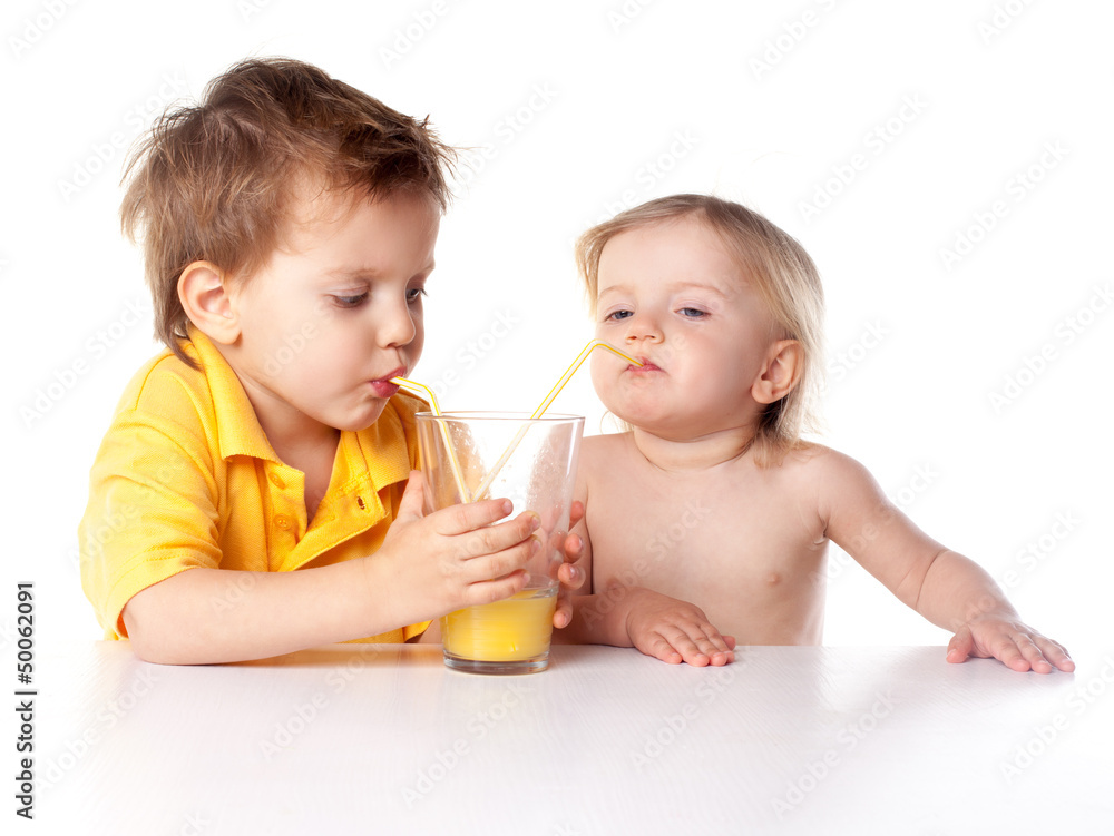 small children drinking juice isolated on white background small children drinking juice isolated on white background