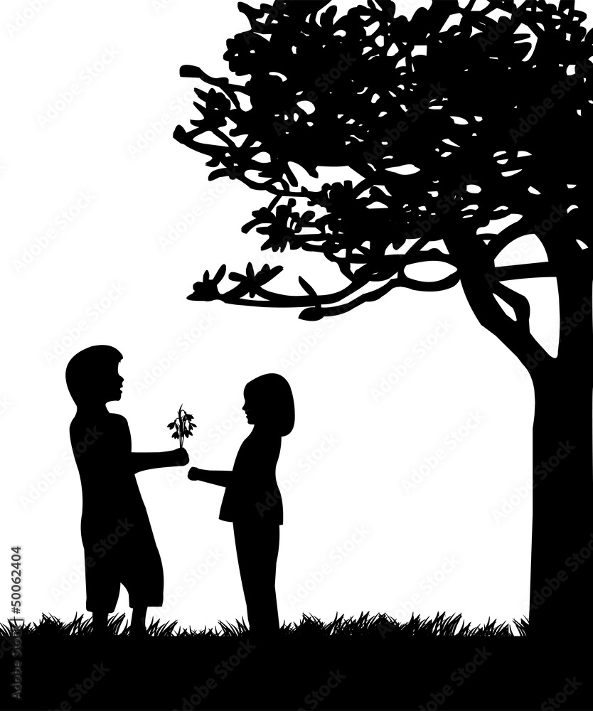 Boy gives a girl flowers, bouquet snowdrops in park silhouette