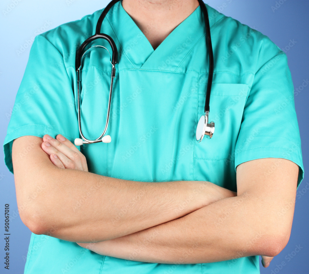 Doctor with stethoscope, on blue background Doctor with stethoscope, on blue background
