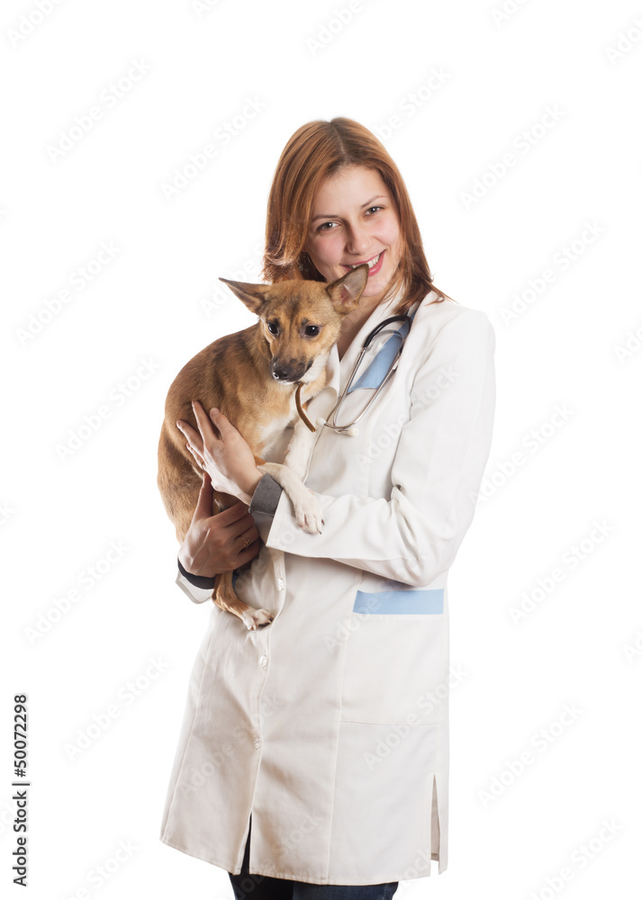 © Happy monkey - young woman veterinarian holding a puppy
