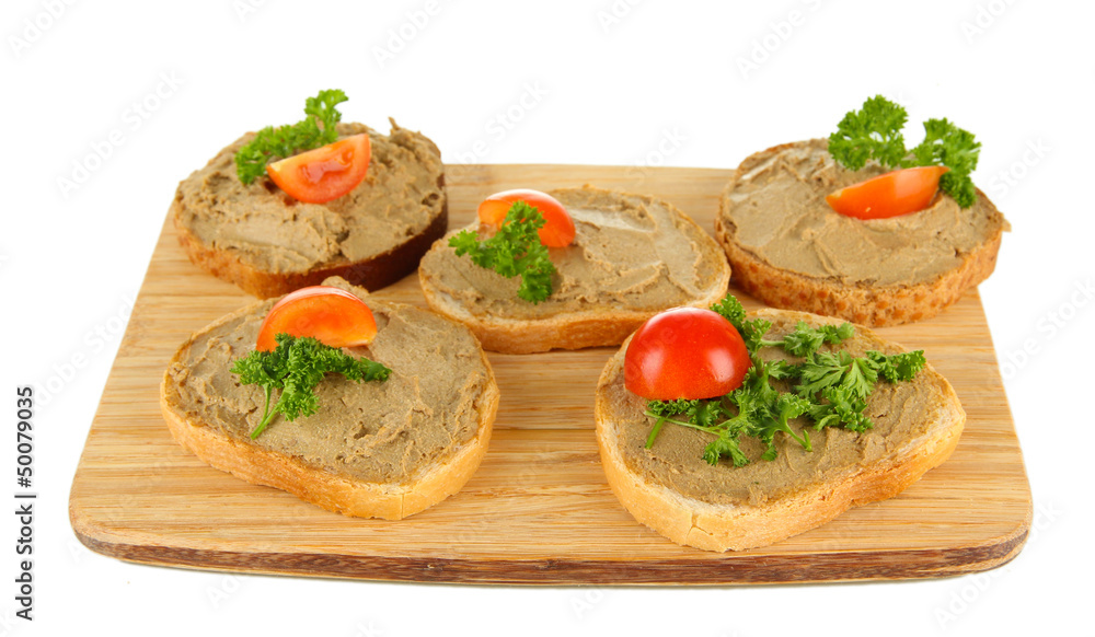 Fresh pate on bread on wooden board, isolated on white Fresh pate on bread on wooden board, isolated on white