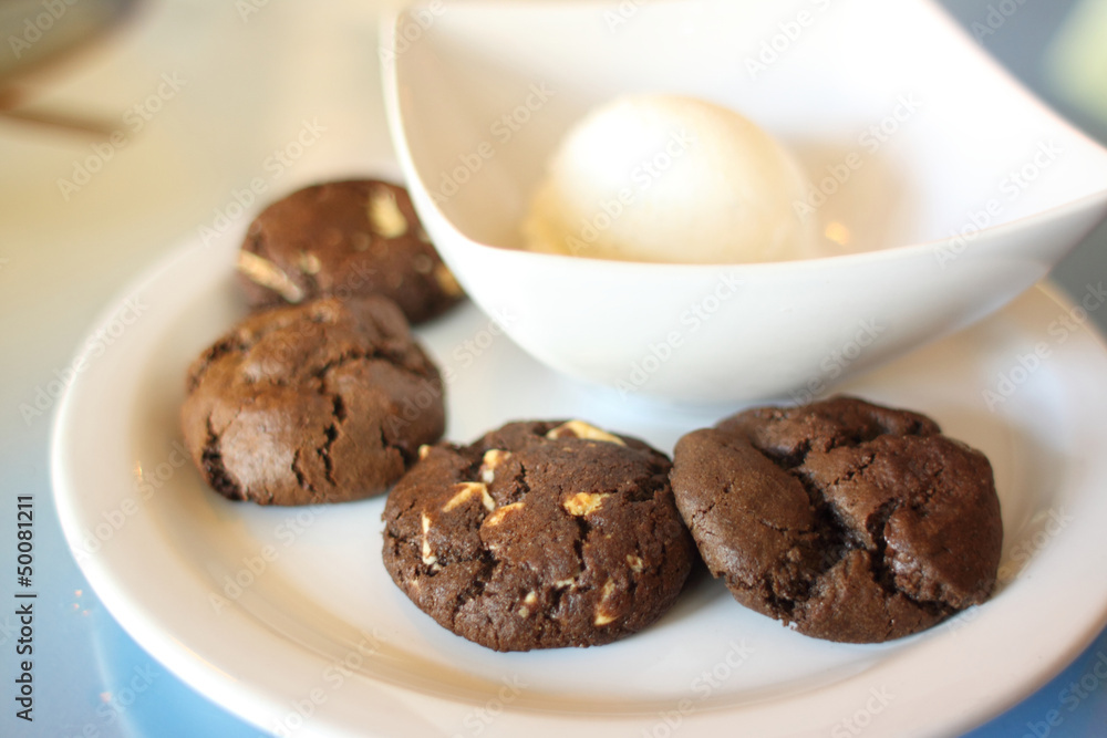 Cookies and ice cream on a dish. Cookies and ice cream on a dish.