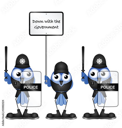 Comical protester flanked by two riot police officers