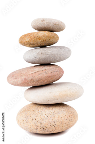 Pile of spa stones isolated on white background