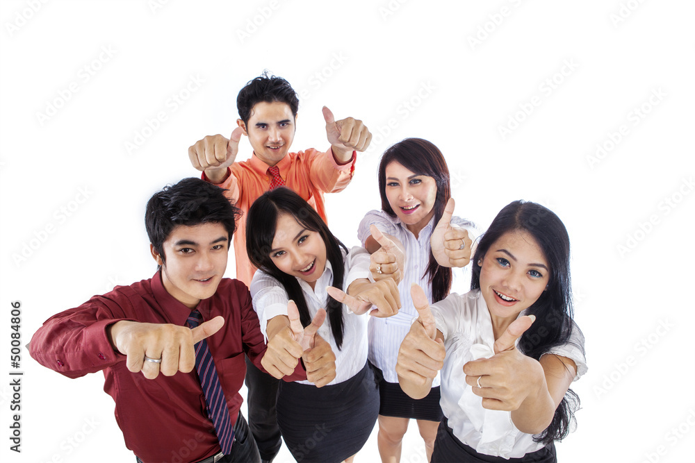 Business people thumbs up Business people thumbs up