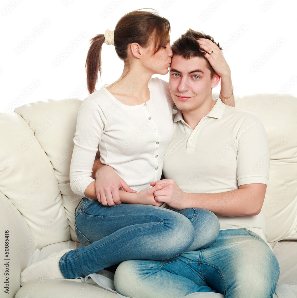 Young couple In love, on a white background, in studio Young couple In love, on a white background, in studio