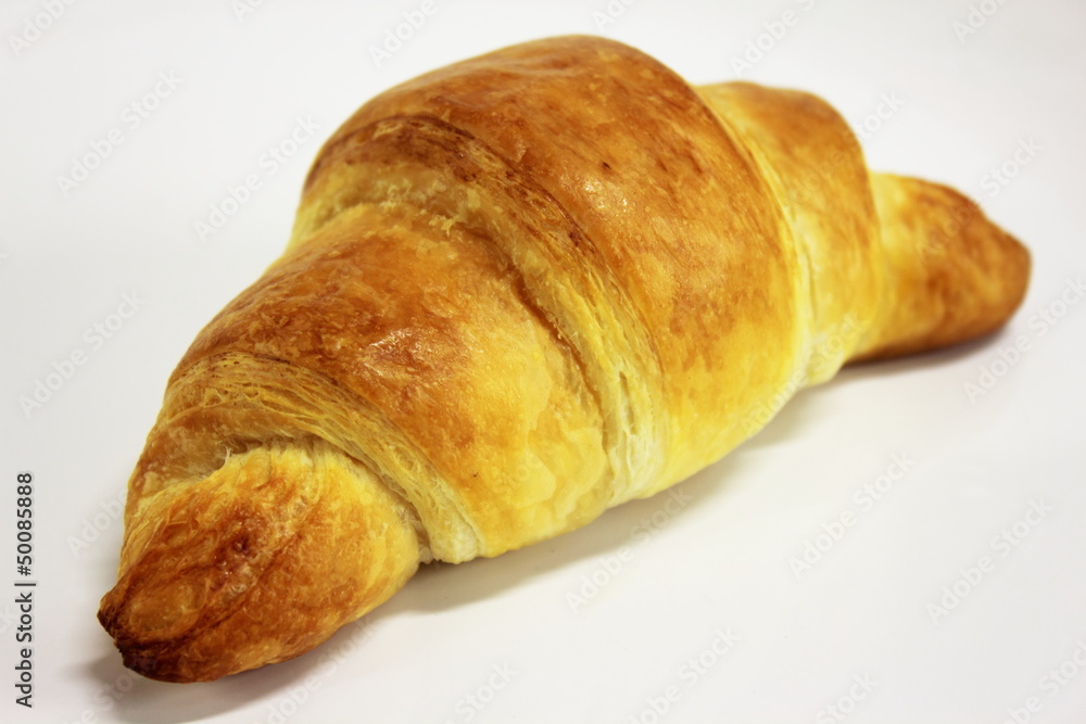 Butter croissant on a white background