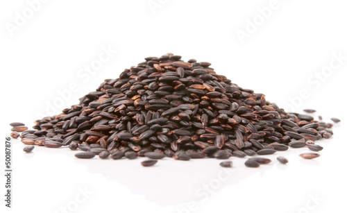 Black "forbidden" rice isolated on white