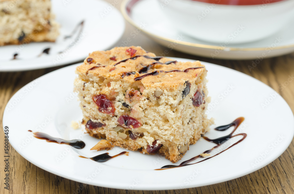 piece of cake with dried cranberries and nuts piece of cake with dried cranberries and nuts