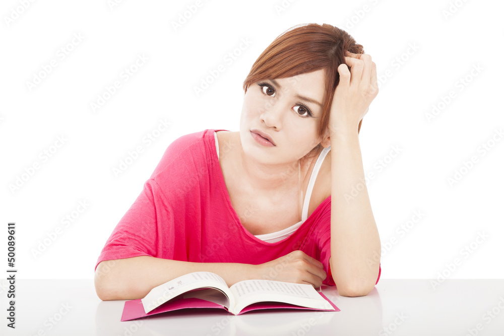 embarrassed school girl studying with book embarrassed school girl studying with book