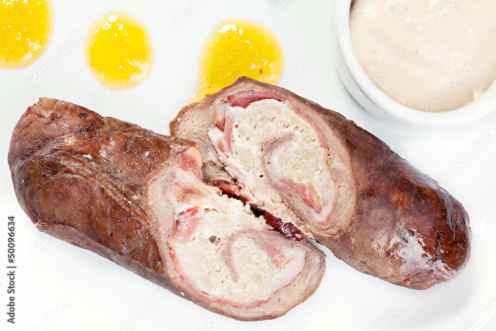 Grilled  sausages with vegetables and sauce